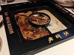 -老牌坊云南鱼豆花火锅(哈西万达店)