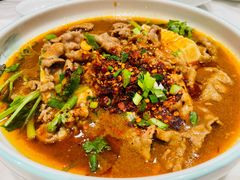 麻婆牛脑豆腐-犇逸·乐山跷脚牛肉·四川现炒(览海店)