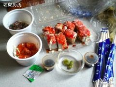 外卖的摩托罗拉卷芥末章鱼酱汁岩螺-慕寿司(大宁路店)