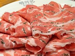 -明何记涮牛肚(品牌首店隋唐植物园南门古城路店)