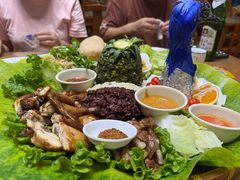 -沐毫傣泐云南菜孔雀宴•手抓饭傣味烧烤(曼听公园店)