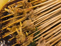 -拈签一笑黄牛肉辣卤串串