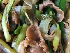 葱爆羊肉-华春餐馆(鱼山路店)
