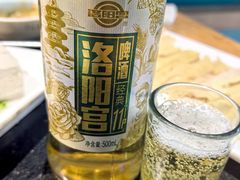 -明何记涮牛肚(品牌首店隋唐植物园南门古城路店)