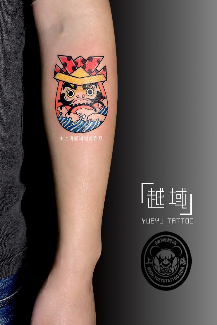 手臂达摩蛋纹身图案