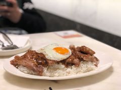 洋葱汁猪扒饭配煎蛋-石板街港澳冰室(天环店)
