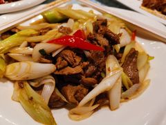 葱爆羊羔肉-巴扎美食·新疆菜·西域歌舞表演餐厅(新疆大厦店)