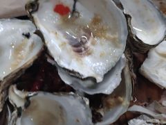 -蚝哥花姐湛江烤生蚝(美丽湾市场店)