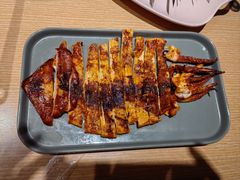 烤鱿鱼小串-街角等你.大连海鲜烧烤.经典铁板海鲜串(西安路店)