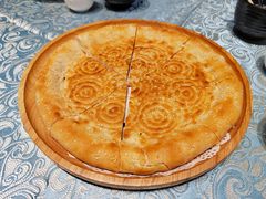 馕坑芝麻馕-巴扎美食·新疆菜·西域歌舞表演餐厅(新疆大厦店)