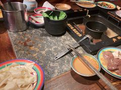 -老牌坊云南鱼豆花火锅(哈西万达店)