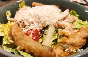 Caesar Salad with Grilled Chicken Skewers