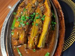 铁板肉末茄子-龙泉人椰子鸡·糟粕醋·地标海南菜(龙昆南店)