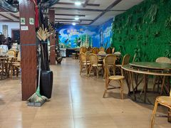 -沐毫傣泐云南菜孔雀宴•手抓饭傣味烧烤(曼听公园店)