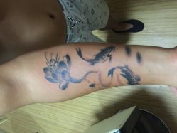 iphone_upload_pic-焰针刺青纹身.手工穿孔饰品·中国刺青名店