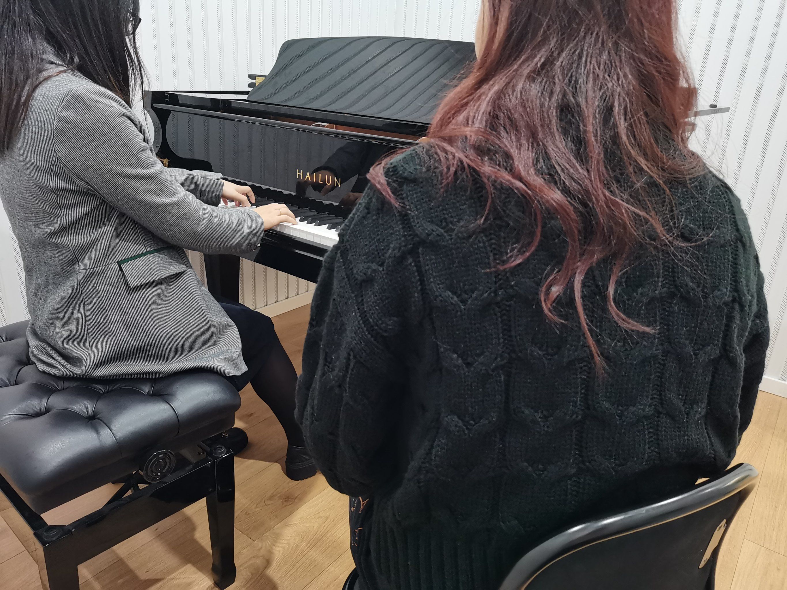 孩子上钢琴陪练课的作用