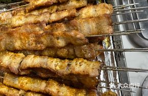 Freshly Sliced and Skewered Pork Belly