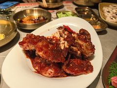 草家招牌酱辣蟹-草家酱蟹炭火烤肉店(珲春南路一店)