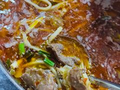 -黄利砖万峰林布依特色酸笋牛肉馆