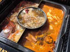 -老牌坊云南鱼豆花火锅(哈西万达店)