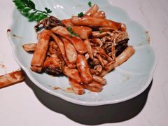 梭子蟹炒年糕-卯时·龙光雅宴·精致锡帮菜(惠山古镇店)