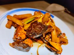 梭子蟹炒年糕-谭家弄堂(兰州中心店)