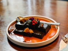 猴头菇鲍汁瑶柱扒制黑豆腐-肴约·花园式餐厅(湖里店)