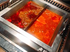 番茄麻辣锅-老牌坊云南鱼豆花火锅(哈西万达店)