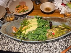 -老牌坊云南鱼豆花火锅(哈西万达店)
