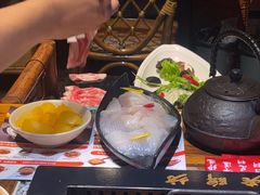 -老牌坊云南鱼豆花火锅(哈西万达店)