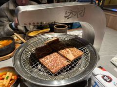 极品浇汁肥牛肋条-草家酱蟹炭火烤肉店(珲春南路一店)