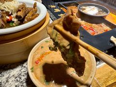 -老牌坊云南鱼豆花火锅(哈西万达店)