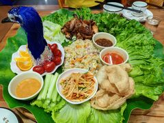 -沐毫傣泐云南菜孔雀宴•手抓饭傣味烧烤(曼听公园店)