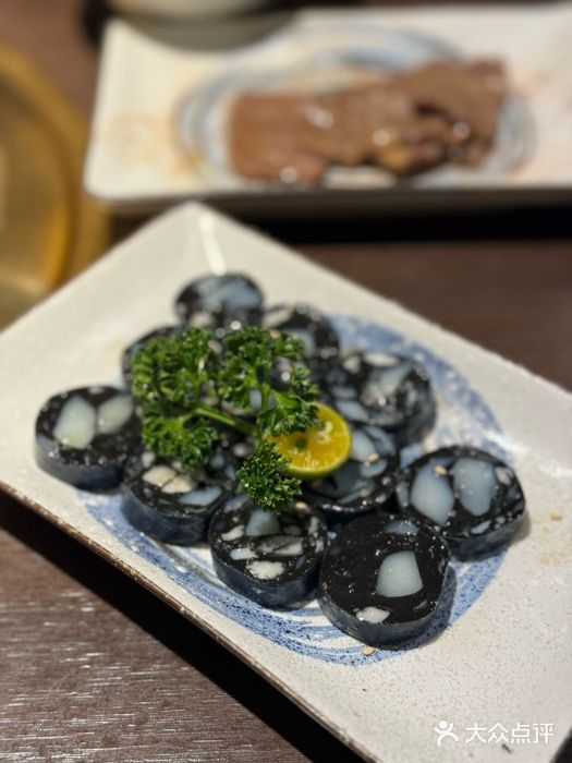 橘焱胡同烧肉夜食(BFC外滩金融中心店)墨鱼香肠图片