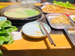 -明何记涮牛肚(品牌首店隋唐植物园南门古城路店)