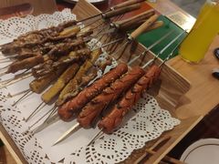 纯手工羊肉串-聚串门儿·东北烧烤(信义坊店)