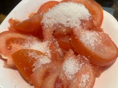 糖拌西红柿-老闵田螺馆·南昌特色小炒(梦时代店)