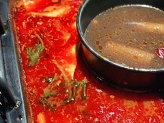 -老牌坊云南鱼豆花火锅(哈西万达店)