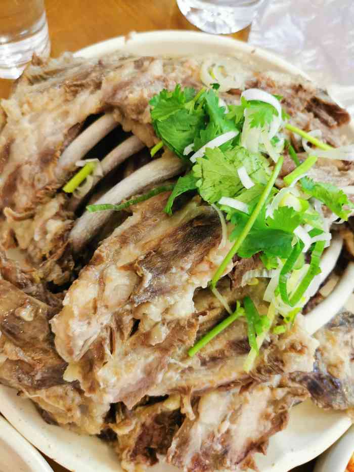 梅花狗肉馆-"听了出租车司机介绍过去的,听着好像有新旧.