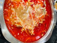 -黄利砖万峰林布依特色酸笋牛肉馆
