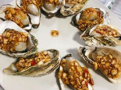 蒜蓉海蛎子-1910老鲁味海鲜·戳子肉·青岛菜(金沙滩店)