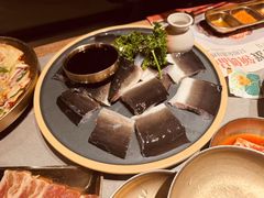 -草家酱蟹炭火烤肉店(珲春南路一店)