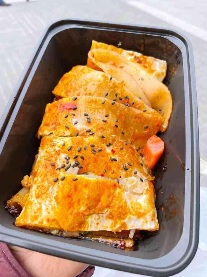 四环冷面王(熙街店)-"「招牌烤冷面」在铁板打上一个鸡蛋,待鸡蛋.