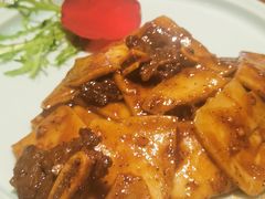 牛仔骨炒年糕-绿茶餐厅(王府井永宁门店)