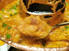 土司铜锅油焖鸡-浩海火烧云傣家菜(京广店)