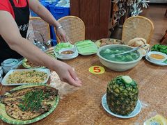 -沐毫傣泐云南菜孔雀宴•手抓饭傣味烧烤(曼听公园店)