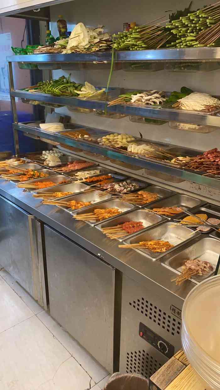 胡记烧烤-"这家烧烤在我家楼下,在我们附近算是比较出.