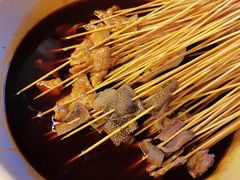 -拈签一笑黄牛肉辣卤串串
