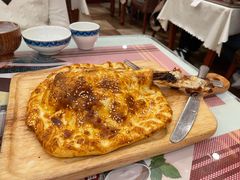 面包馕烤羊腿-巴依老爷新疆美食(清华东门店)