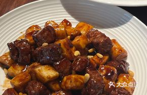 Pine Nuts and Snowflake Steak with Rice Cake